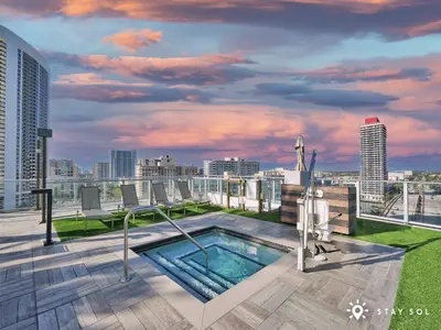 a rooftop hot tub on the roof of a building at Ocean Views - Balcony & Resort Pool Paradise in Hollywood
