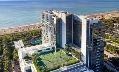 an aerial view of a building with a tennis court at SOUTH BEACH Stunning Studio in Miami Beach