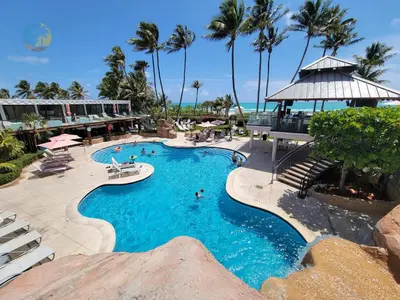 a pool at a resort with people in it at Alexander 1010 in Miami Beach