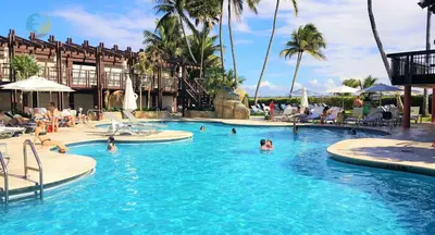 a group of people in a swimming pool at a resort at Alexander 1115 in Miami Beach