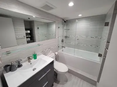 a bathroom with a sink and a toilet and a shower at Alexander 1121 in Miami Beach