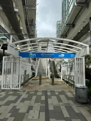 a blue and white sign in a building at Chic Downtown Studio with City Views in Miami