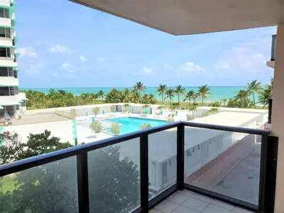 a balcony with a view of the ocean at Alexander 510 in Miami Beach