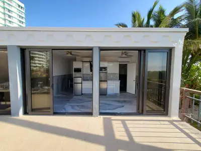 a room with sliding glass doors on a house at Alexander 802 in Miami Beach