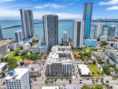 an aerial view of a city with tall buildings at Stylish 1BR Unit With Free Parking Near Wynwood in Miami