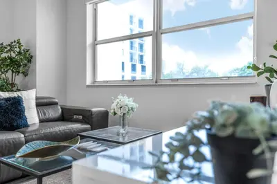 a living room with a couch and a coffee table at Sunny 1BR Unit With Free Parking Prime Location in Miami