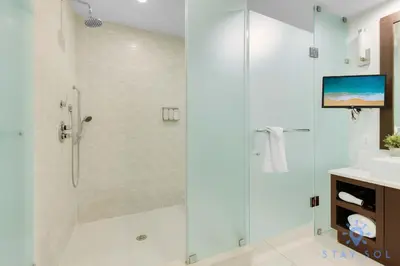 a bathroom with a shower and a sink at Stylish Apartment 1BR - 2BTH in Miami