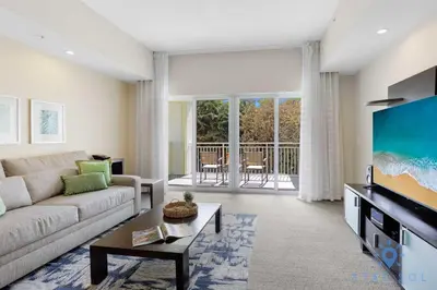 a living room with a couch and a tv at Stylish Apartment 1BR - 2BTH in Miami