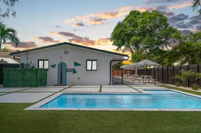 a house with a swimming pool in the yard at Designer 1BR Retreat Heart of Miami Pool in Miami