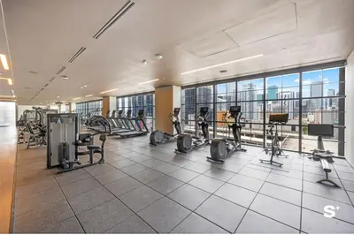 a gym with cardio equipment in a building at Skyline 1-BD Condo - City & Ocean View in Miami