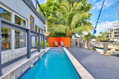 a swimming pool in front of a building at 320-1 Las Olas Boulevard in Fort Lauderdale