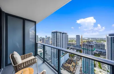 a balcony with a view of a city at Upscale 1-BD Condo in DTW Miami - City Views in Miami