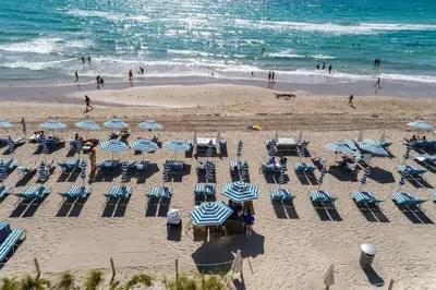an overhead view of a beach with chairs and umbrellas at Miami Escape Views & Amenities in Hollywood