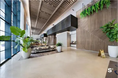 a hallway with potted plants in a building at Modern Studio in Downtown Miami with Stunning City Views in Miami