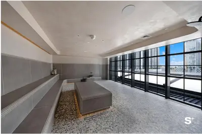 a large room with a couch and large windows at Modern Studio in Downtown Miami with Stunning City Views in Miami