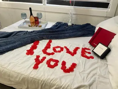 a sign that says love written on a bed at AMIRI Hollywood 5 mins from Hard Rock Stadium & The Guitar in Hollywood