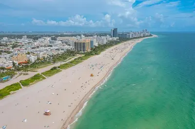 an aerial view of a beach and the ocean at One block from beach South Beach Ocean Dr-King Bed in Miami Beach