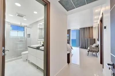 a bathroom with a toilet and a sink at Luxury Oceanfront 3 Bedroom condo on the beach 16 Floor in Hollywood