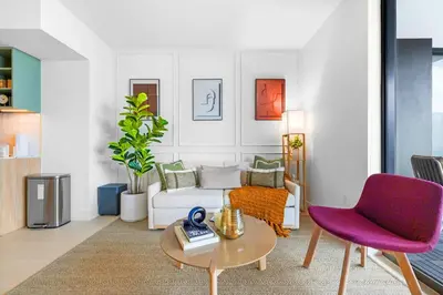 a living room with a couch and a table at From 43th Floor a Luxury Condo Awaits For You! in Miami