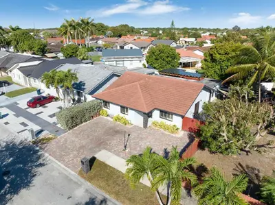 an overhead view of a house with a roof at Casa Brisa - Stylish BBQ Near heart of Kendall in Miami