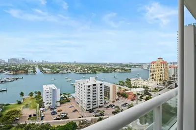 a view of a harbor from a balcony of a building at Ritz-Carlton Luxury Oceanfront 2BR on 16th Floor in Fort Lauderdale