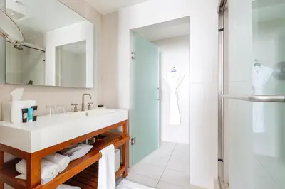 a bathroom with a sink and a shower at 16th Floor Luxury 2 Bedroom - Ocean Views & Luxury in Fort Lauderdale