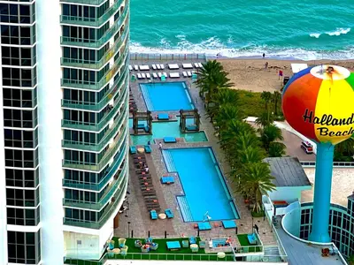 an aerial view of the beach and the ocean at Lyfe Resort 2307 in Hollywood