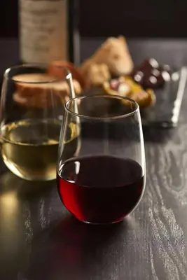 two glasses of wine sitting on a table at Hyatt Place Miami Airport East in Miami