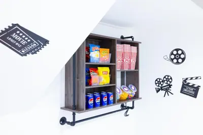 a shelf with food and drinks on it at The Glow House w Cinema, Disco, Pool, BBQ, 9 beds in Ives Estates