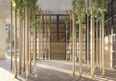 a row of bamboo poles with plants in a building at 2 bedroom Stylish Condo Downtown Pool Gym spa in Miami