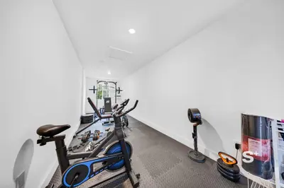 a gym with a exercise bike in a room at Stylish 1-BD Apt in Miami Gym, BBQ, Free Parking in Miami