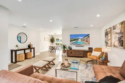 a living room with a couch and chairs at Villa Miami Oasis and Heated Pool in University Park