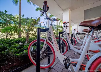 a group of bikes parked next to each other at 1BR on Miami Beach with Beach Service & Near Mall in Hallandale Beach