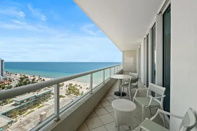 a balcony with a view of the ocean at Ritz-Carlton Luxury Oceanview 3-Bedroom Residence in Fort Lauderdale