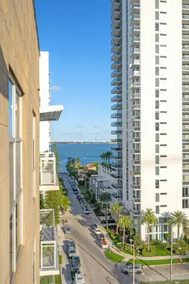 a view of the ocean from the balcony of a building at Luxury 2BR with City Views on Biscayne Blvd in Miami