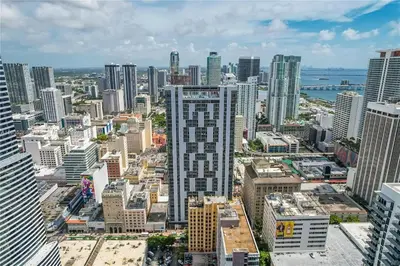an aerial view of a city with tall buildings at Pop Art Sunlit Apartment Prime Miami Pool Free Parking in Miami