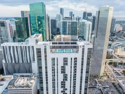 an aerial view of a city with tall buildings at Pop Art Sunlit Apartment Prime Miami Pool Free Parking in Miami
