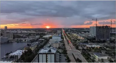 a view of a city with the sunset in the background at Studio Beach Apmt 2 Full Q Beds, Amazing View in Hallandale Beach