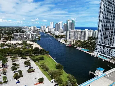 a view of a river in a city with tall buildings at 1BR 1BA with Pool & Sun in Miami Beach in Hallandale Beach