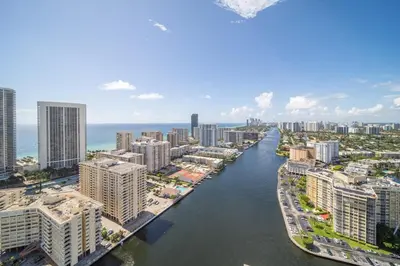 an aerial view of a city with a river at Perfect getaway beach pool and gym 2B 2B in Hallandale Beach