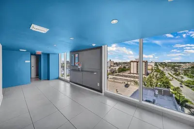 an empty room with a view of a city at Enjoy Miami Beach Pool and Restaurant 2B 2B 2007 in Hallandale Beach