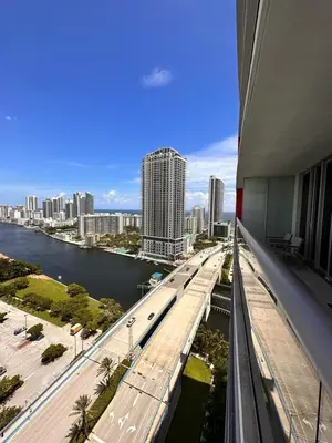 a view of a city with a river and buildings at Ocean Gym Pool Restaurant All in one Place 2B 1506 in Hallandale Beach
