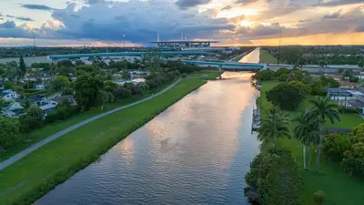 an aerial view of a river with a bridge at Renovated Sept 2024! Pool - Mini Golf - Volleyball in Joe Robbie Stadium Heliport