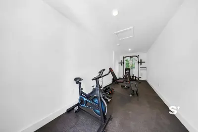 a gym with two exercise bikes in a room at Modern Studio - Gym & Parking Close to Aventura in Miami
