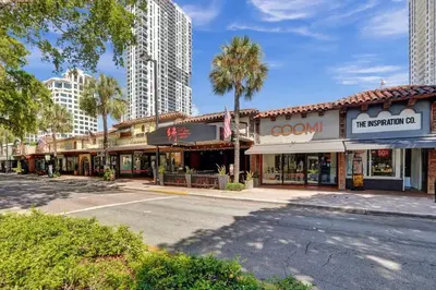 an empty street in a city with tall buildings at Eden Escape Walk to FLT Beach 2107 in Fort Lauderdale