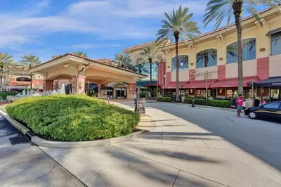 a street in front of a shopping mall at Eden Escape Walk to FLT Beach 1105 in Fort Lauderdale