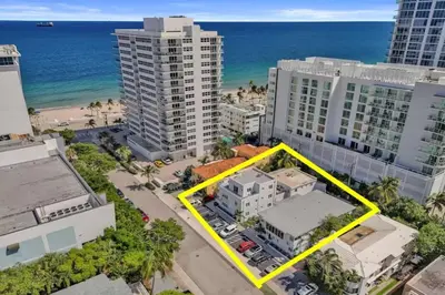 an aerial view of a building in front of the ocean at Eden Escape Walk to FLT Beach 1105 in Fort Lauderdale