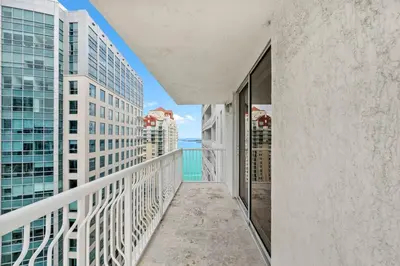 a balcony with views of the ocean and buildings at Stunning 3Bedroom 34th Floor Brickell Free Parking in Miami