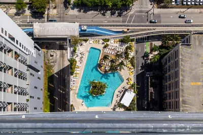 an overhead view of a swimming pool in a city at Magnificent 3 Bedrooms in Downtown Miami with incredible views in Miami