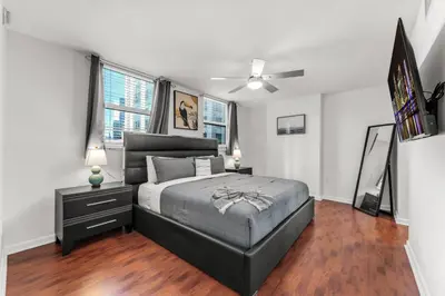 a bedroom with a bed and a ceiling fan at Perfectly Located Miami 3BR with Stunning Views in Miami